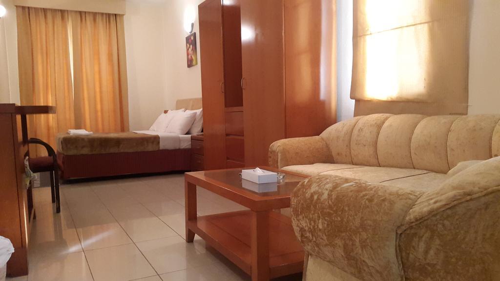 Al Raien Hotel Apartment Dubái Habitación foto