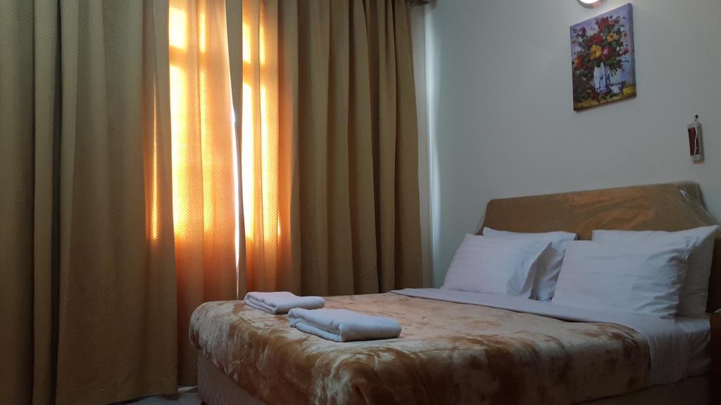 Al Raien Hotel Apartment Dubái Habitación foto